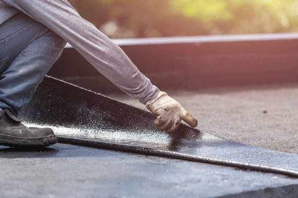 Professional Waterproofing technician working in Livingston, NJ